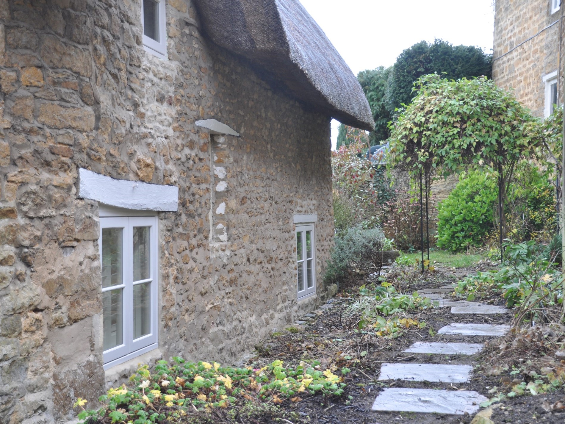 The cottage has gardens to the side and rear 